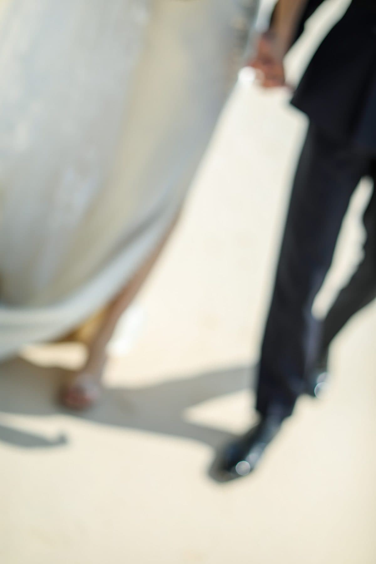 A couple walking together on their wedding day